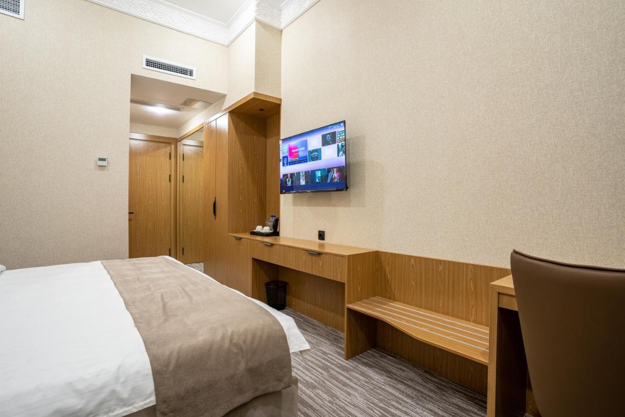 Mirzo Hotel Tasken Kültér fotó