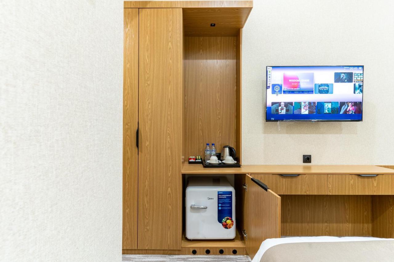 Mirzo Hotel Tasken Kültér fotó