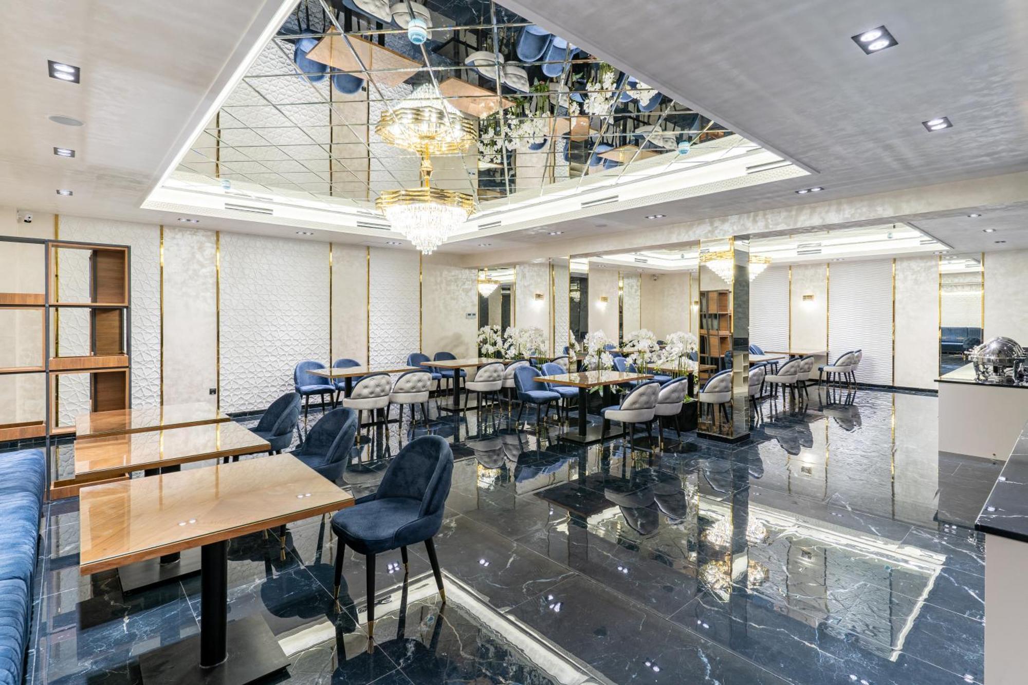 Mirzo Hotel Tasken Kültér fotó