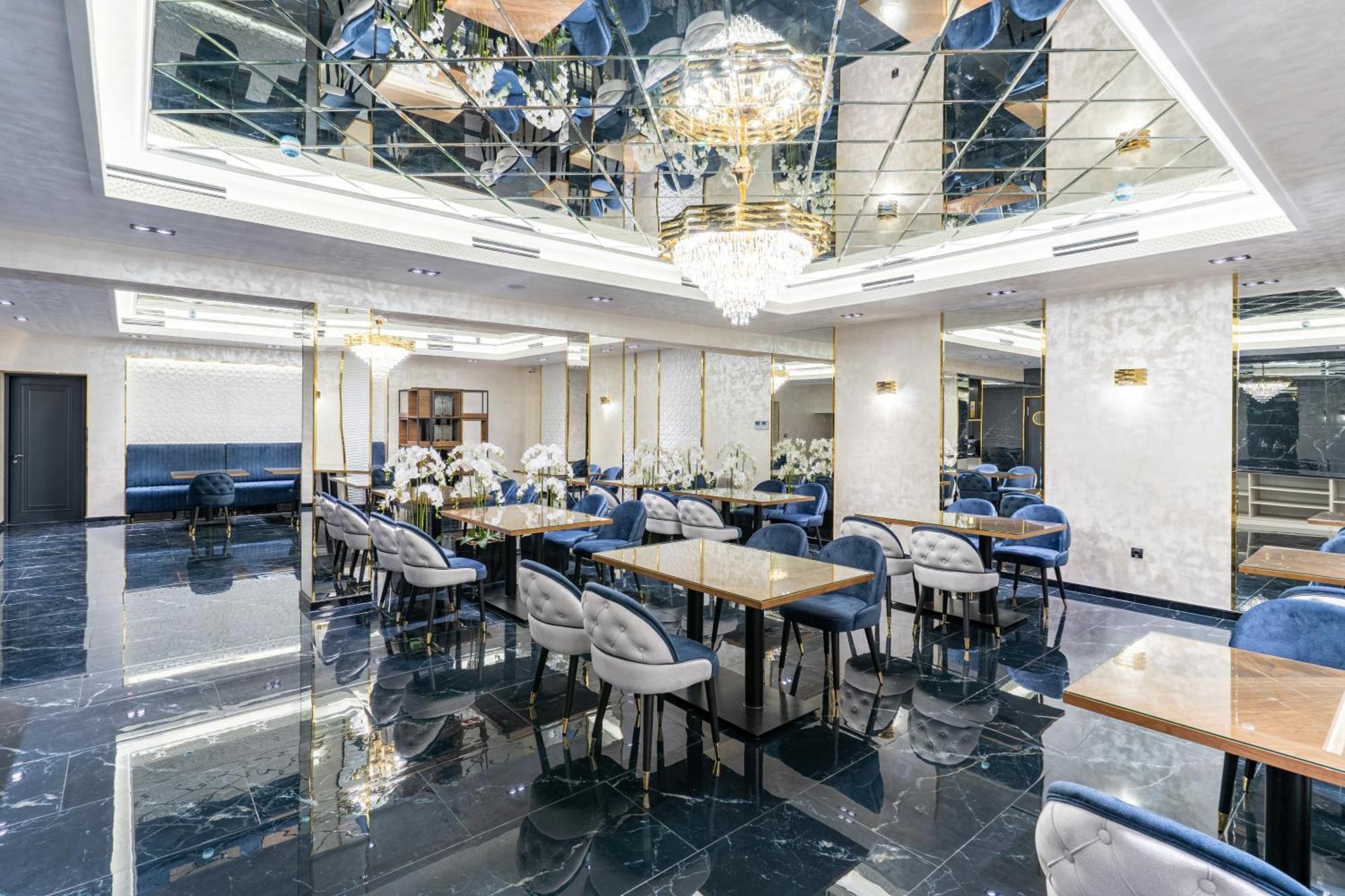 Mirzo Hotel Tasken Kültér fotó